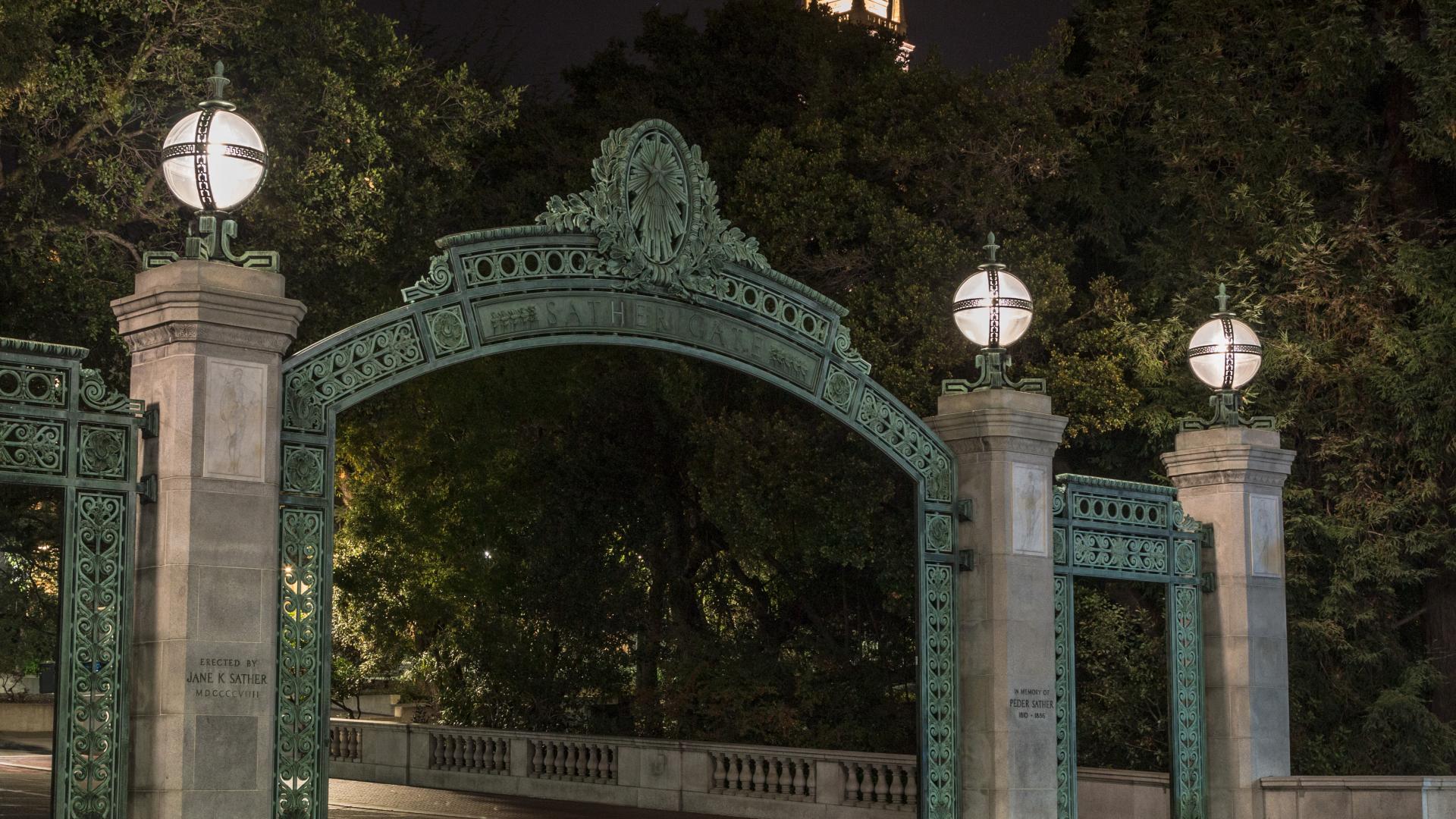 An arch on the Berkeley campus at night